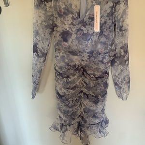 Very pretty metallic ruffle dress.